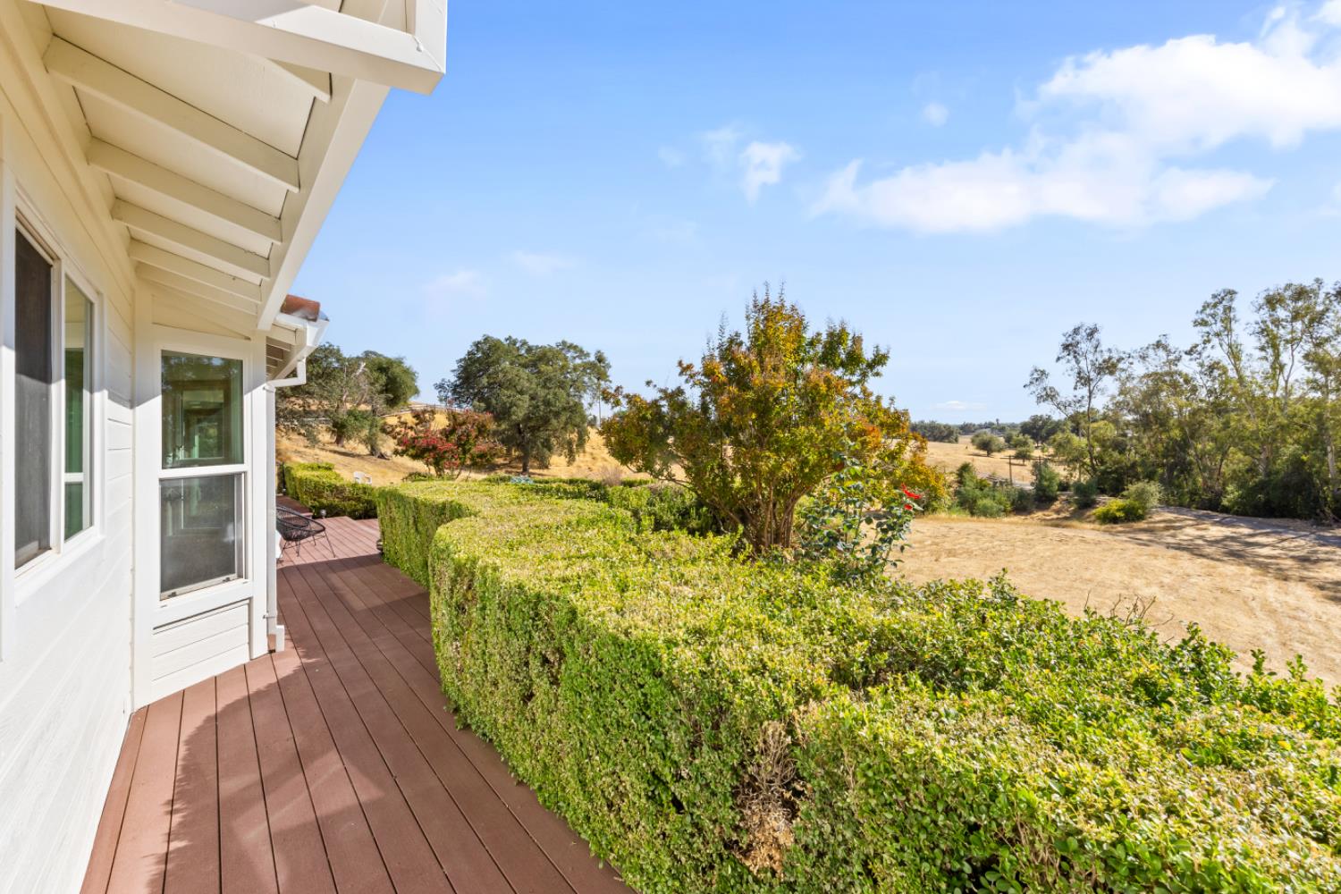 2495 Meadow Creek Road Lincoln, CA 95648 - Photo 64 of 94 a view of a balcony with wooden floor and city view