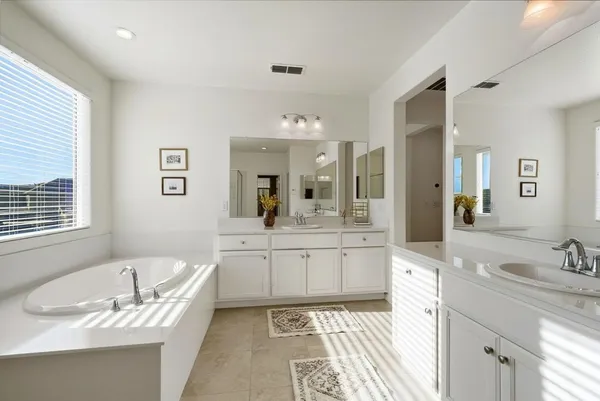 a utility room with cabinets