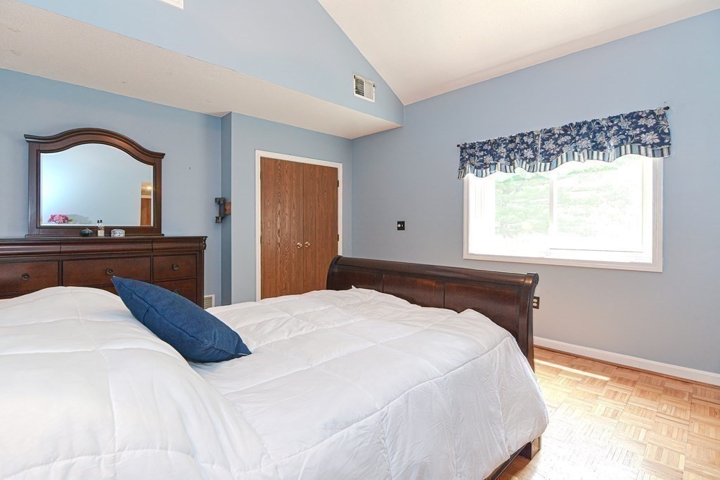 9 Crown's Way, Unit 9 Uxbridge, MA 01569 - Photo 18 of 40 a bedroom with a bed and a window