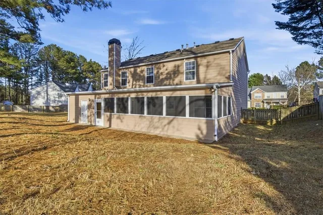 a view of a house with a swimming pool