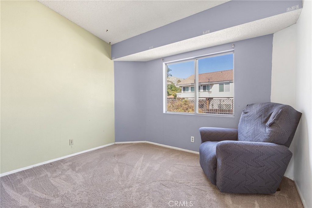 24321 Barley Road Moreno Valley, CA 92557 - Photo 31 of 66 a living room with furniture and a window