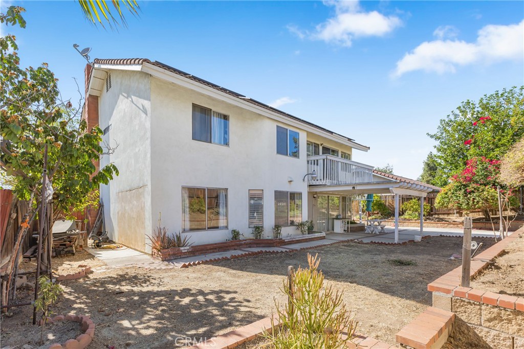 24321 Barley Road Moreno Valley, CA 92557 - Photo 35 of 66 a front view of a house with a yard