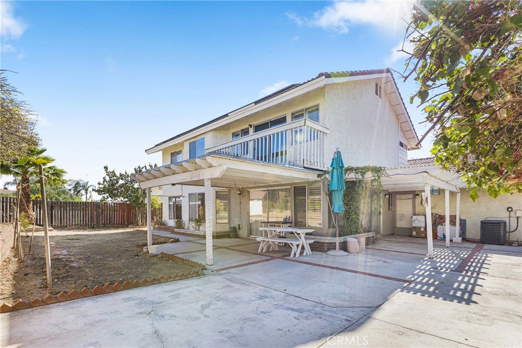 24321 Barley Road Moreno Valley, CA 92557 - Photo 37 of 66 a patio with table and chairs