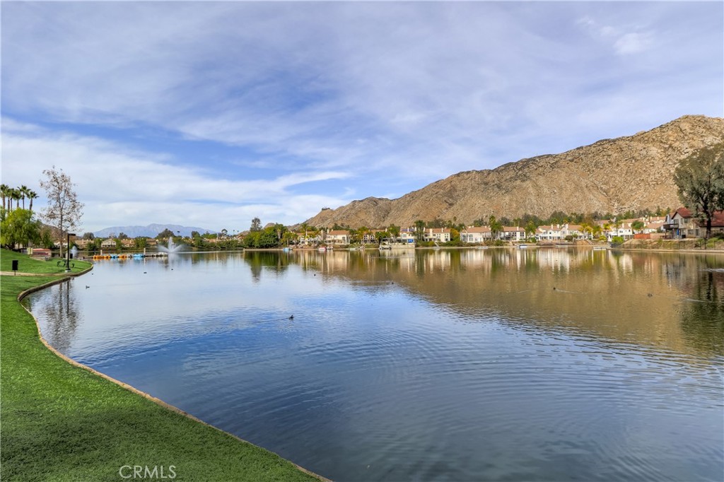24321 Barley Road Moreno Valley, CA 92557 - Photo 63 of 66 a view of a lake with houses in the back