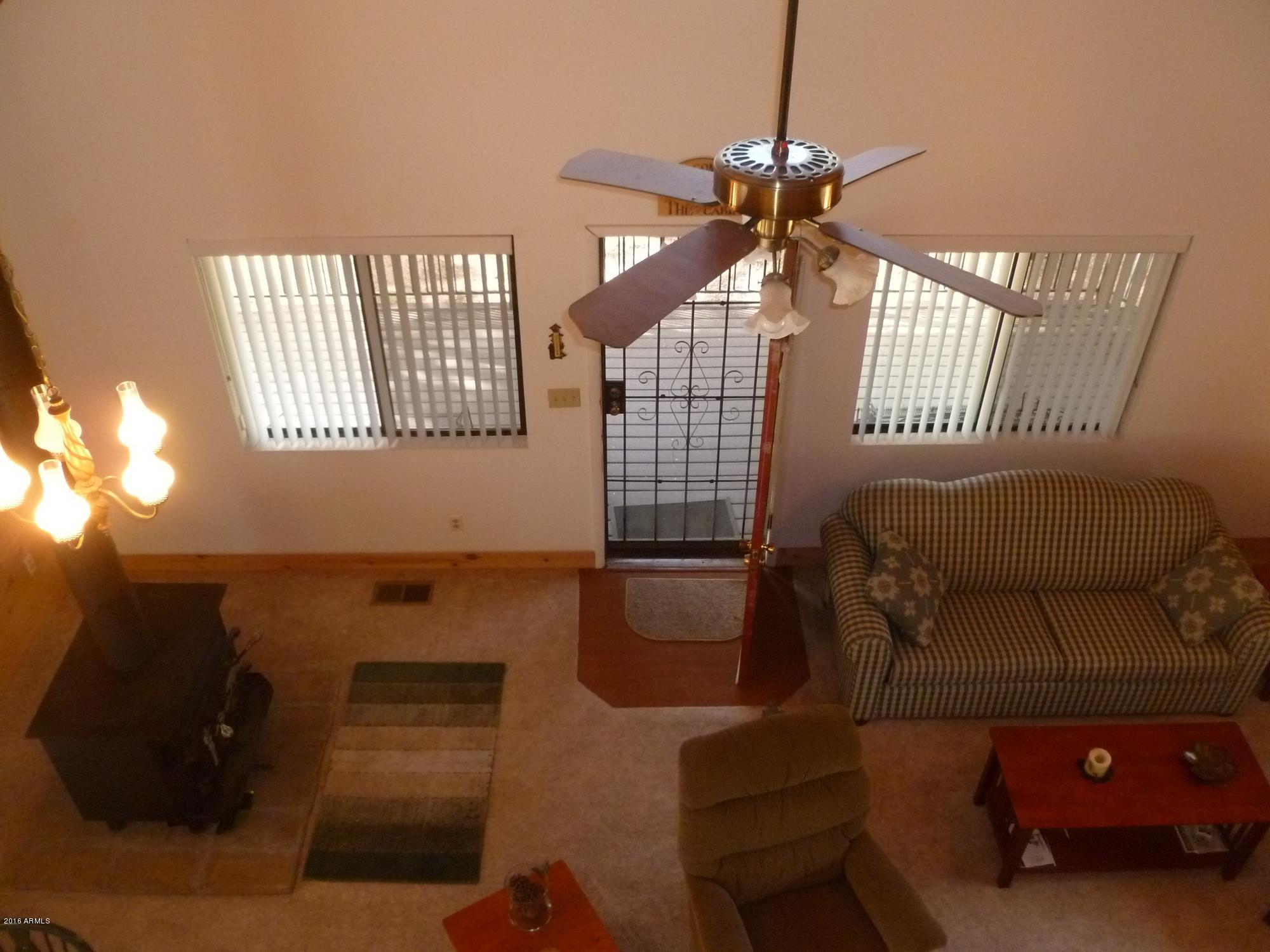 3050 Aspen Road Overgaard, AZ 85933 - Photo 15 of 23 View From Loft Into LR