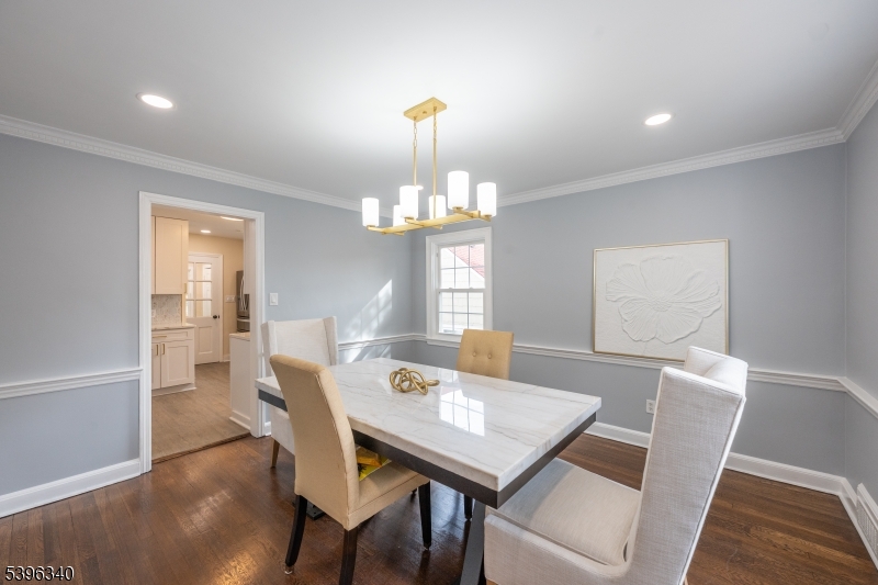 211 Conway Court South Orange, NJ 07079 - Photo 16 of 26 a view of a dining room with furniture window and wooden floor