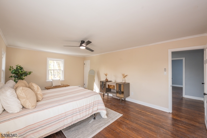 211 Conway Court South Orange, NJ 07079 - Photo 18 of 26 a bedroom with a bed window and couch