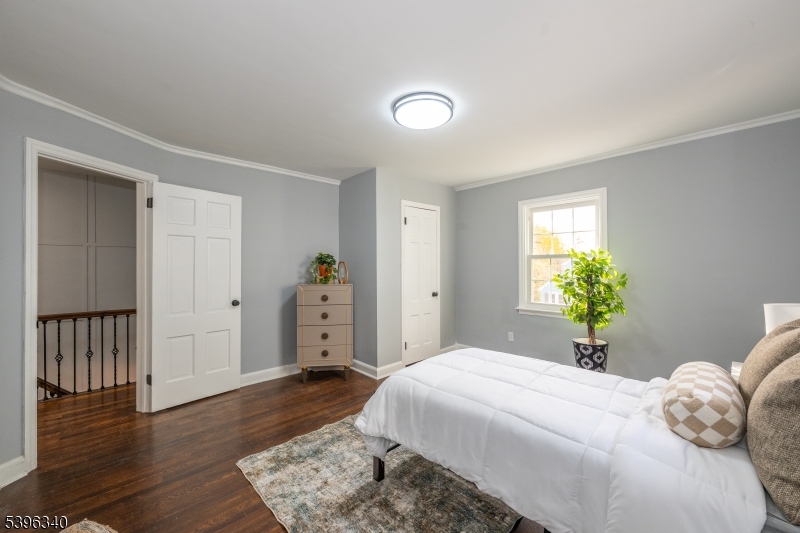 211 Conway Court South Orange, NJ 07079 - Photo 22 of 26 a bedroom with a bed and a window