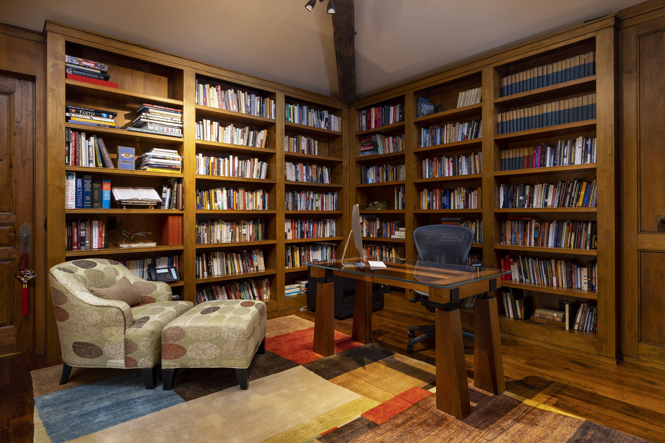 2692 Sycamore Canyon Road Montecito, CA 93108 - Photo 15 of 24 a view of a livingroom with furniture and bookshelf