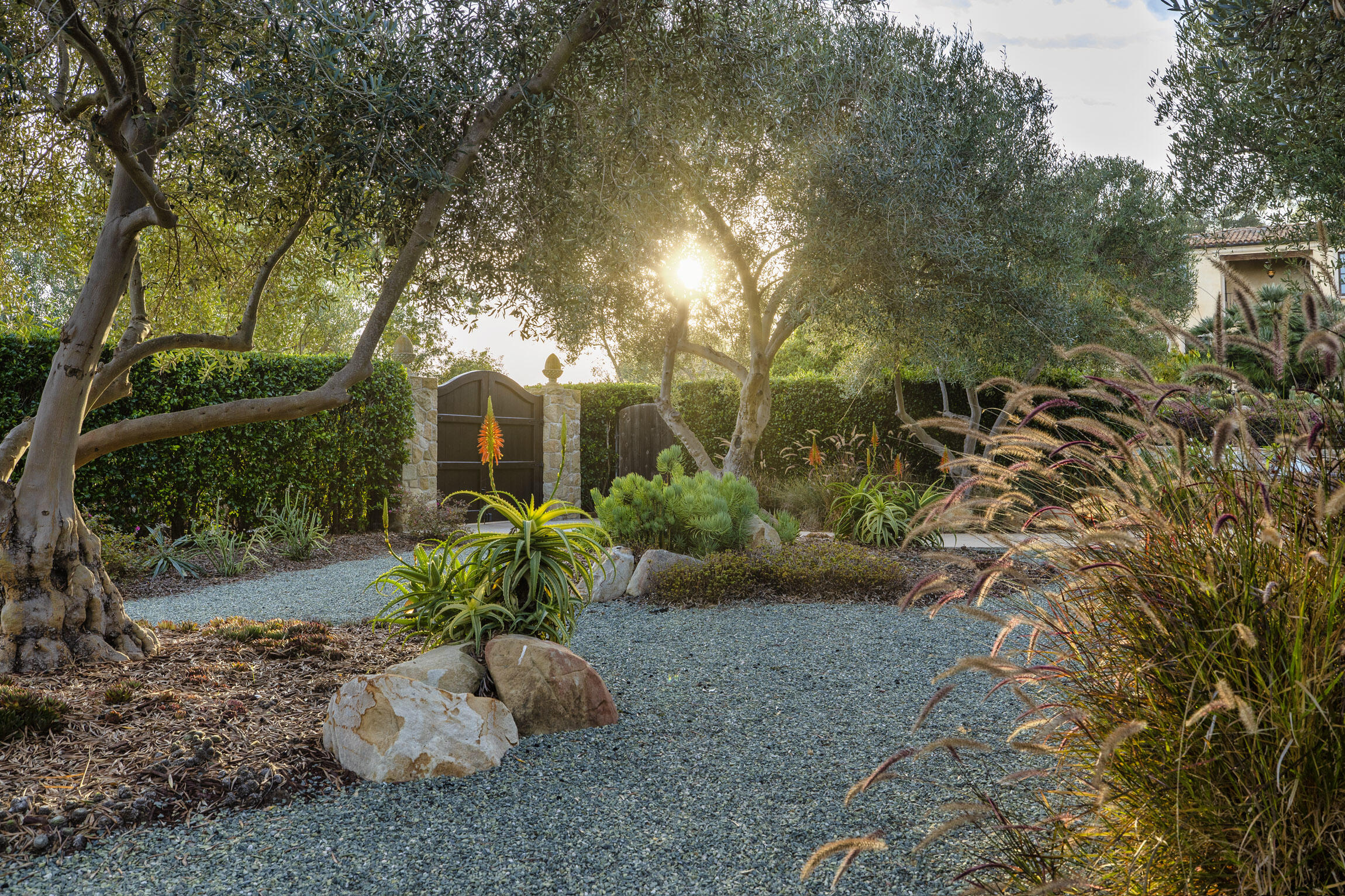 2692 Sycamore Canyon Road Montecito, CA 93108 - Photo 17 of 24 a front view of a house with a yard and outdoor seating
