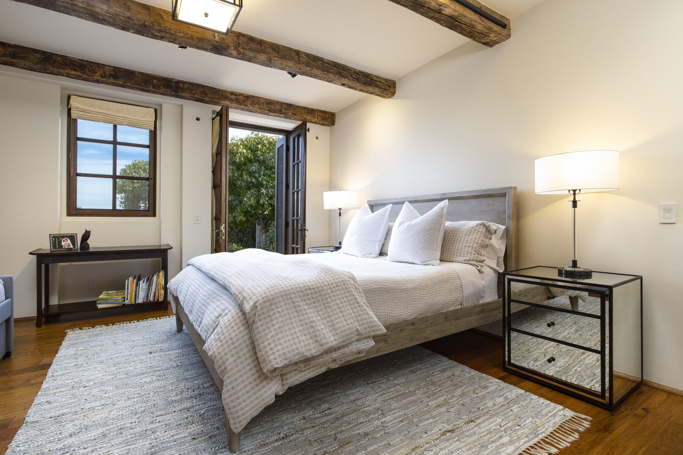 2692 Sycamore Canyon Road Montecito, CA 93108 - Photo 20 of 24 a bedroom with a bed and a night stand