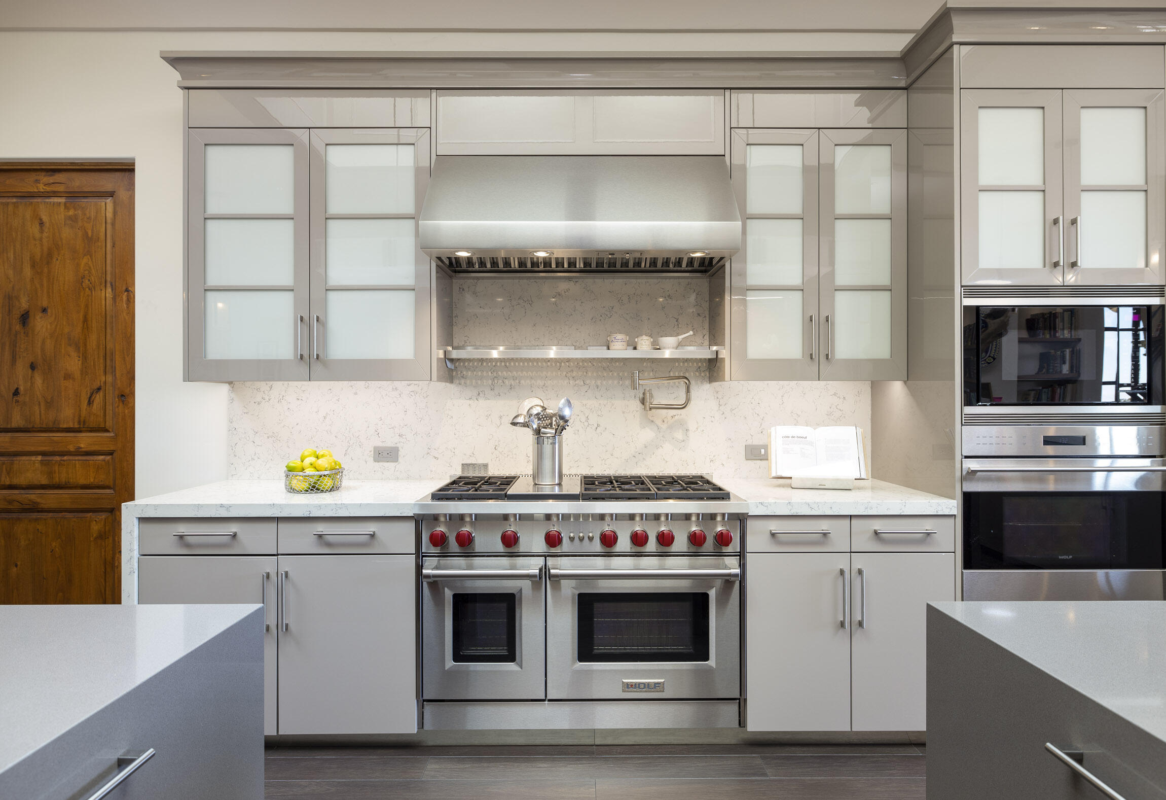 2692 Sycamore Canyon Road Montecito, CA 93108 - Photo 7 of 24 a kitchen with stainless steel appliances a white stove and cabinets