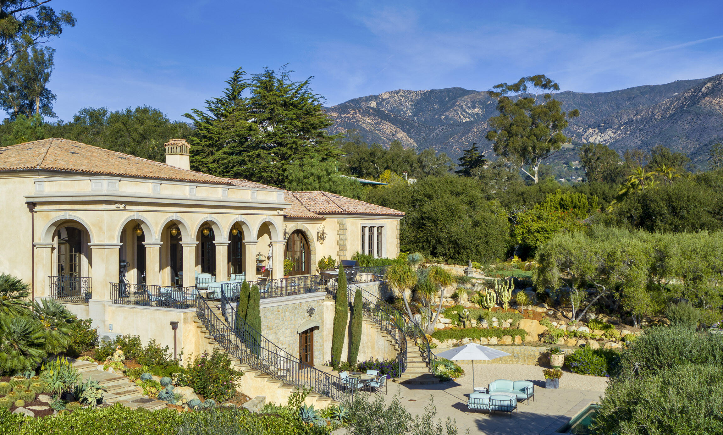 2692 Sycamore Canyon Road Montecito, CA 93108 - Photo 9 of 24 a front view of a house with a yard and mountain view