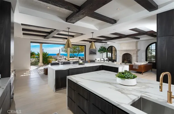 a living room with a couch a table gym equipment and a large window