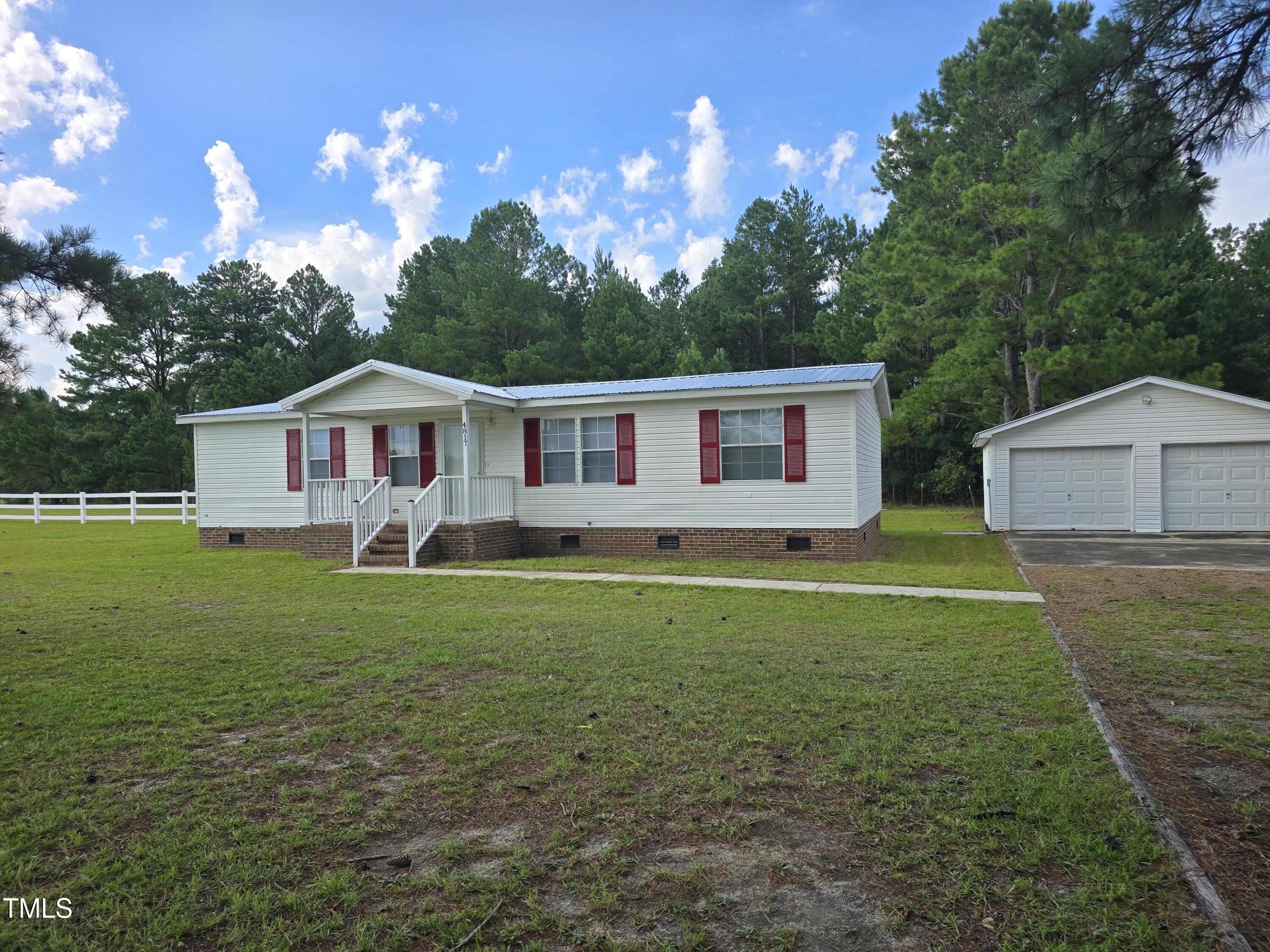 front View showing house and garage