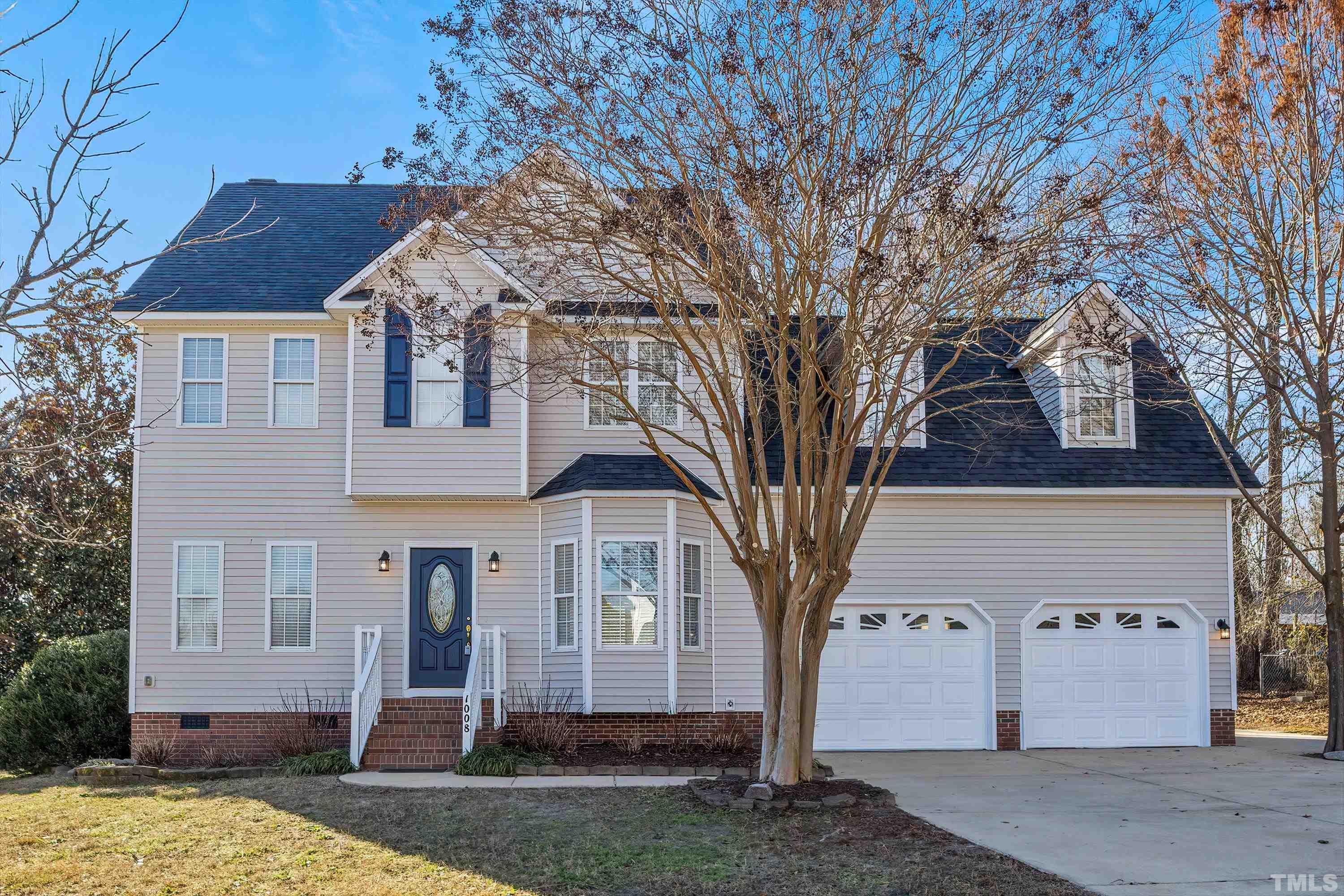 a front view of house with yard