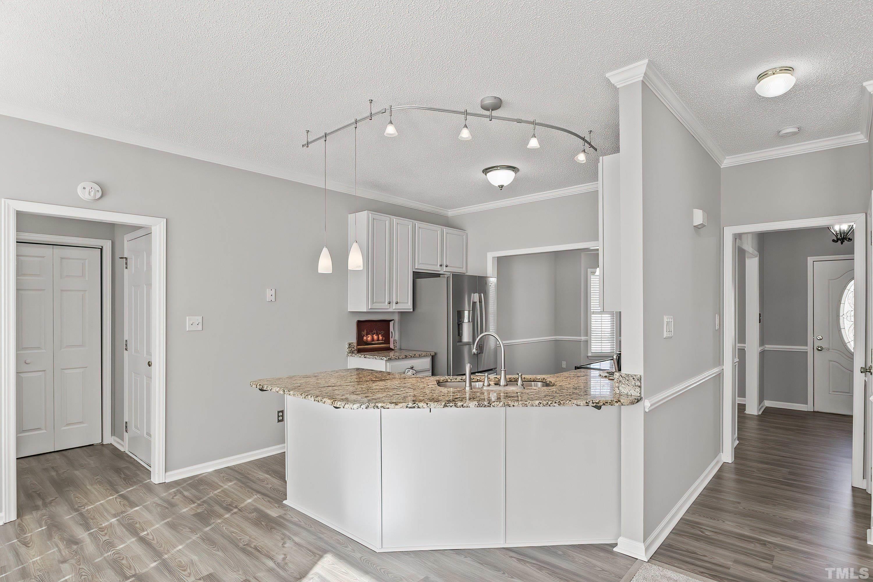 1008 Linden Crest Road Raleigh, NC 27603 - Photo 13 of 37 a bathroom with a sink double vanity and a mirror