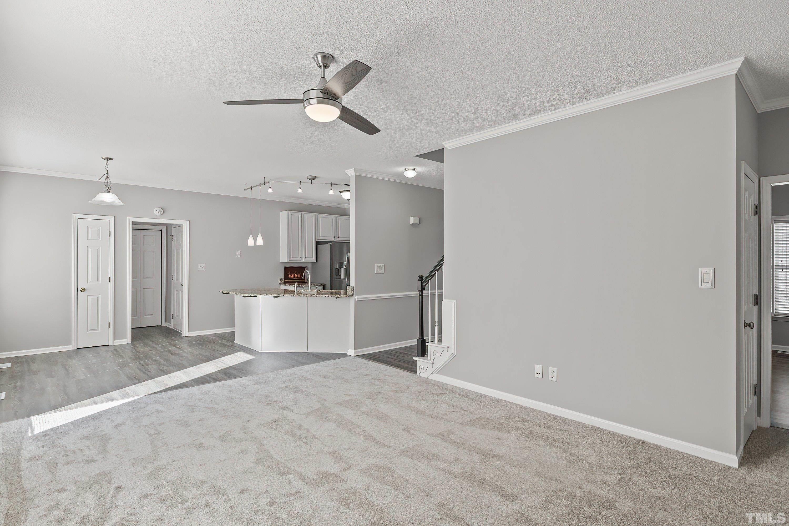 1008 Linden Crest Road Raleigh, NC 27603 - Photo 14 of 37 a view of a room with a sink and a mirror