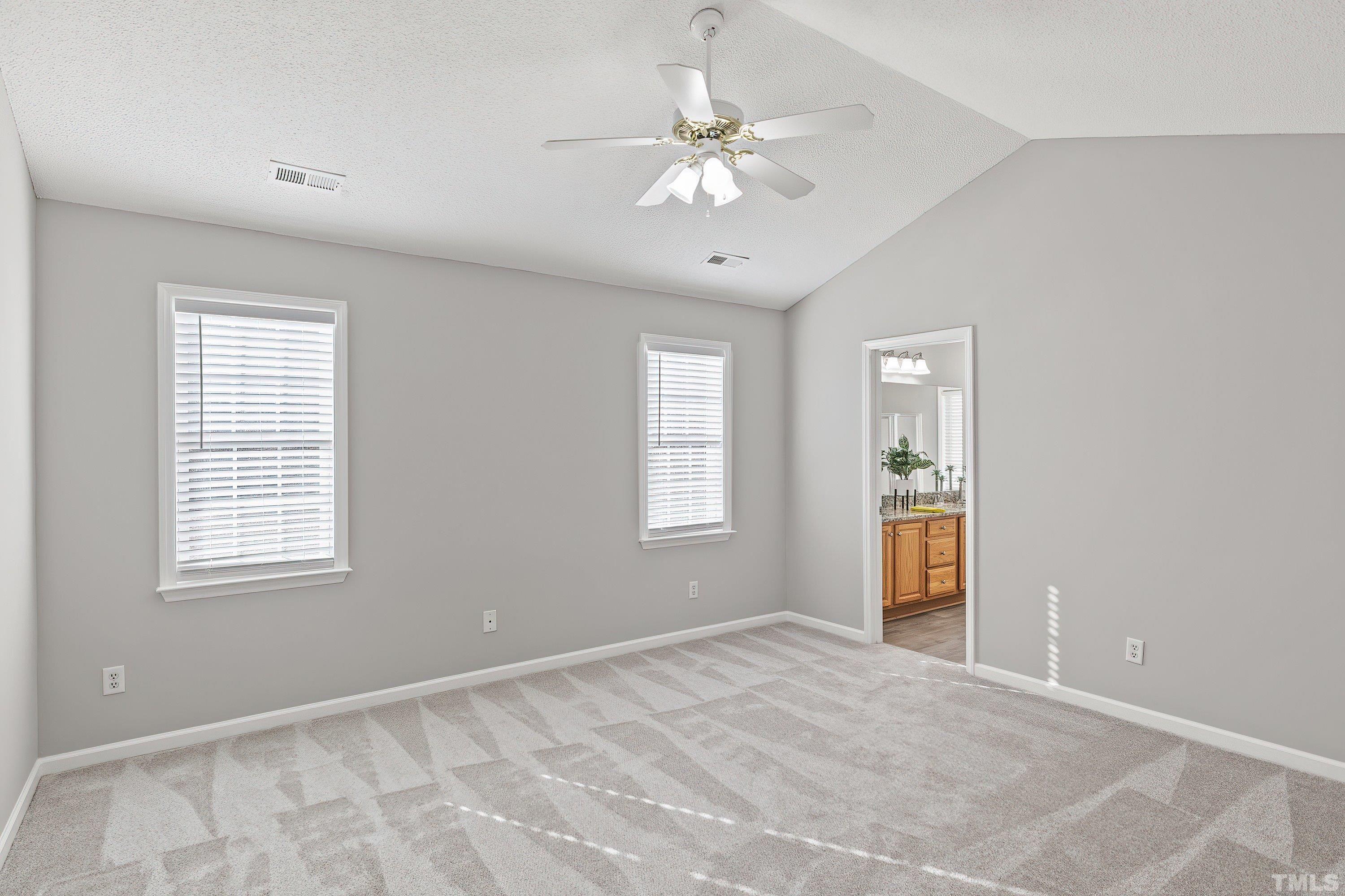 1008 Linden Crest Road Raleigh, NC 27603 - Photo 17 of 37 a view of an empty room with a window
