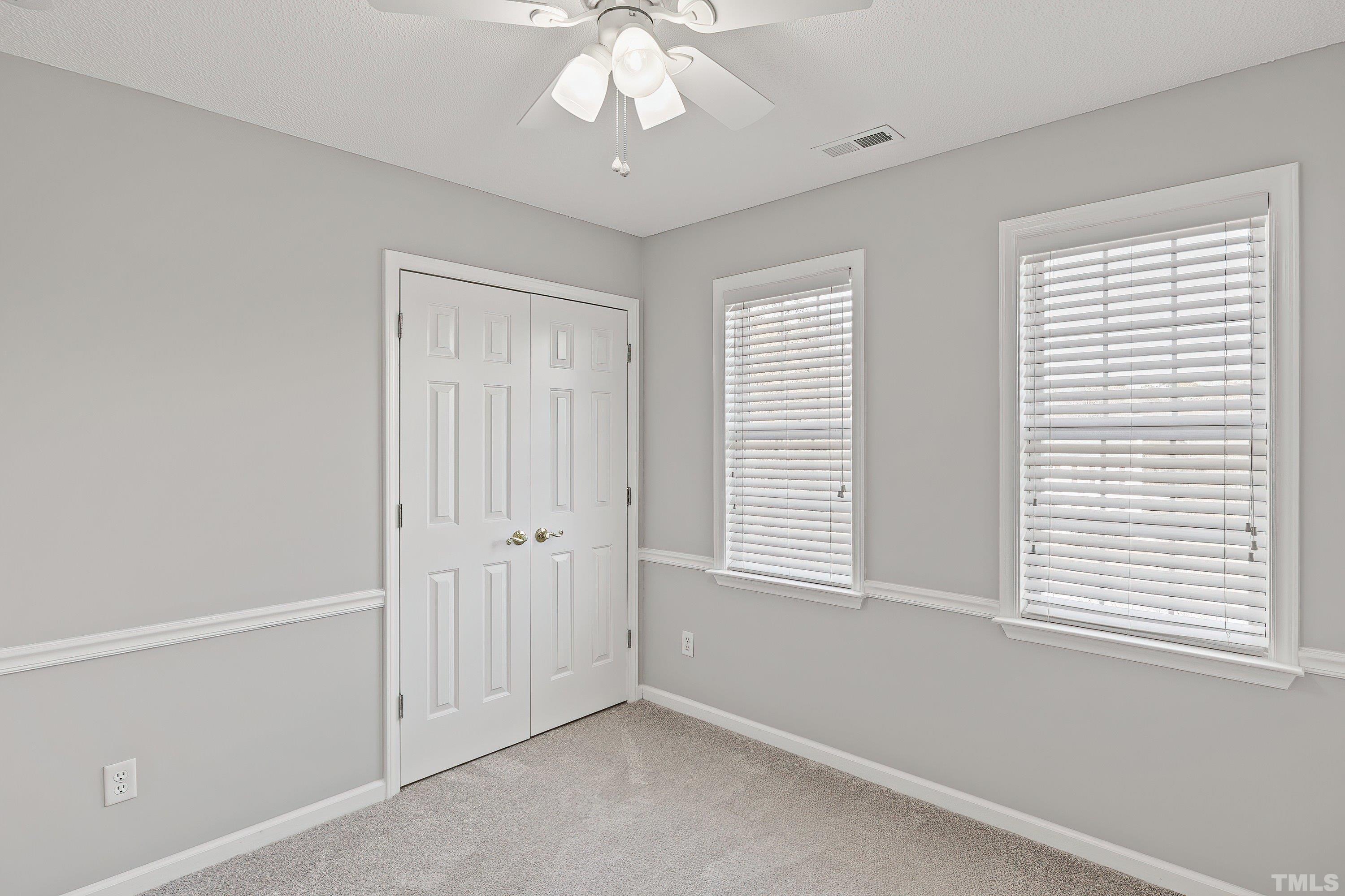 1008 Linden Crest Road Raleigh, NC 27603 - Photo 23 of 37 a view of an empty room with a window