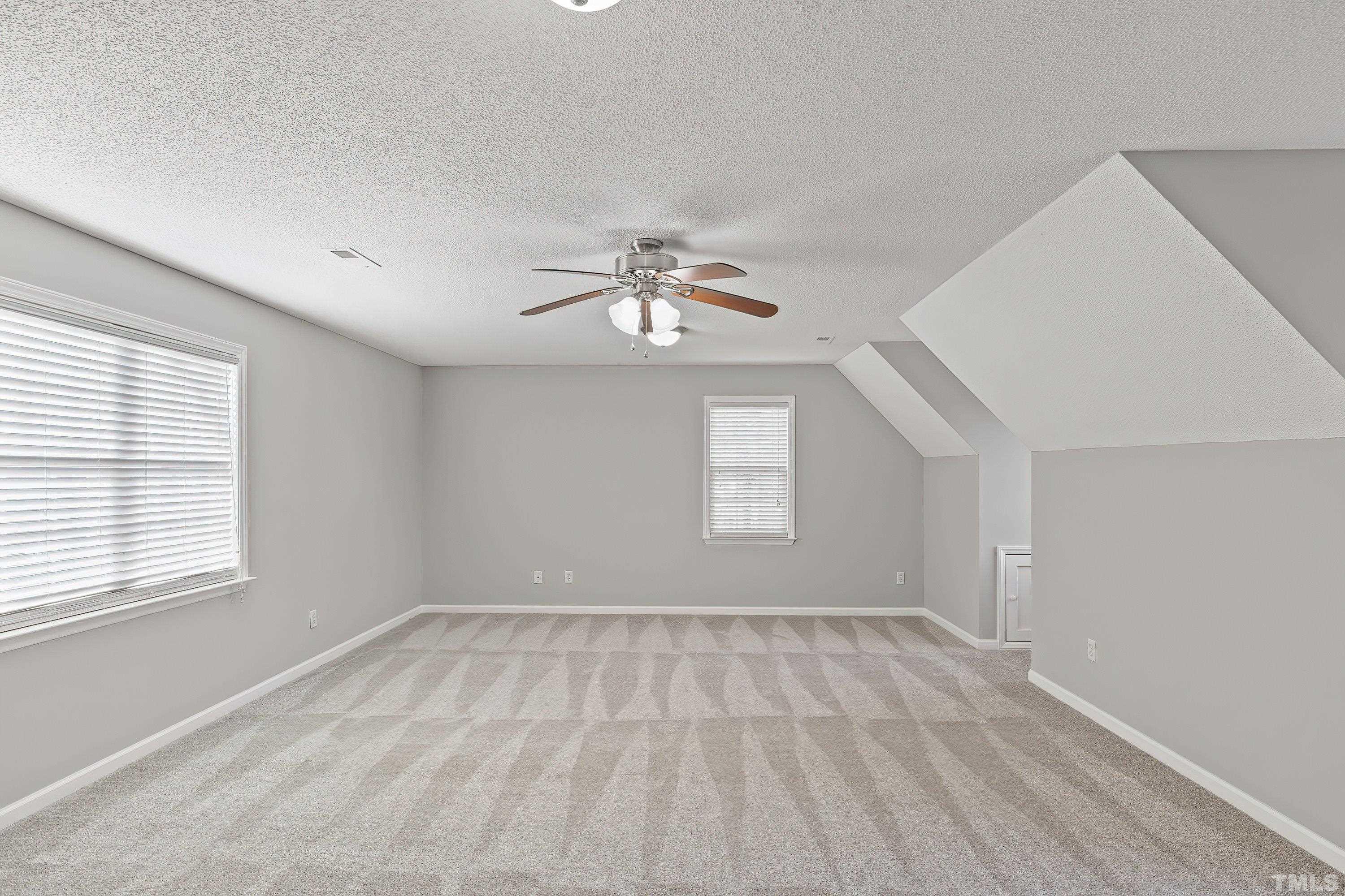 1008 Linden Crest Road Raleigh, NC 27603 - Photo 25 of 37 a view of wooden floor and windows in a room
