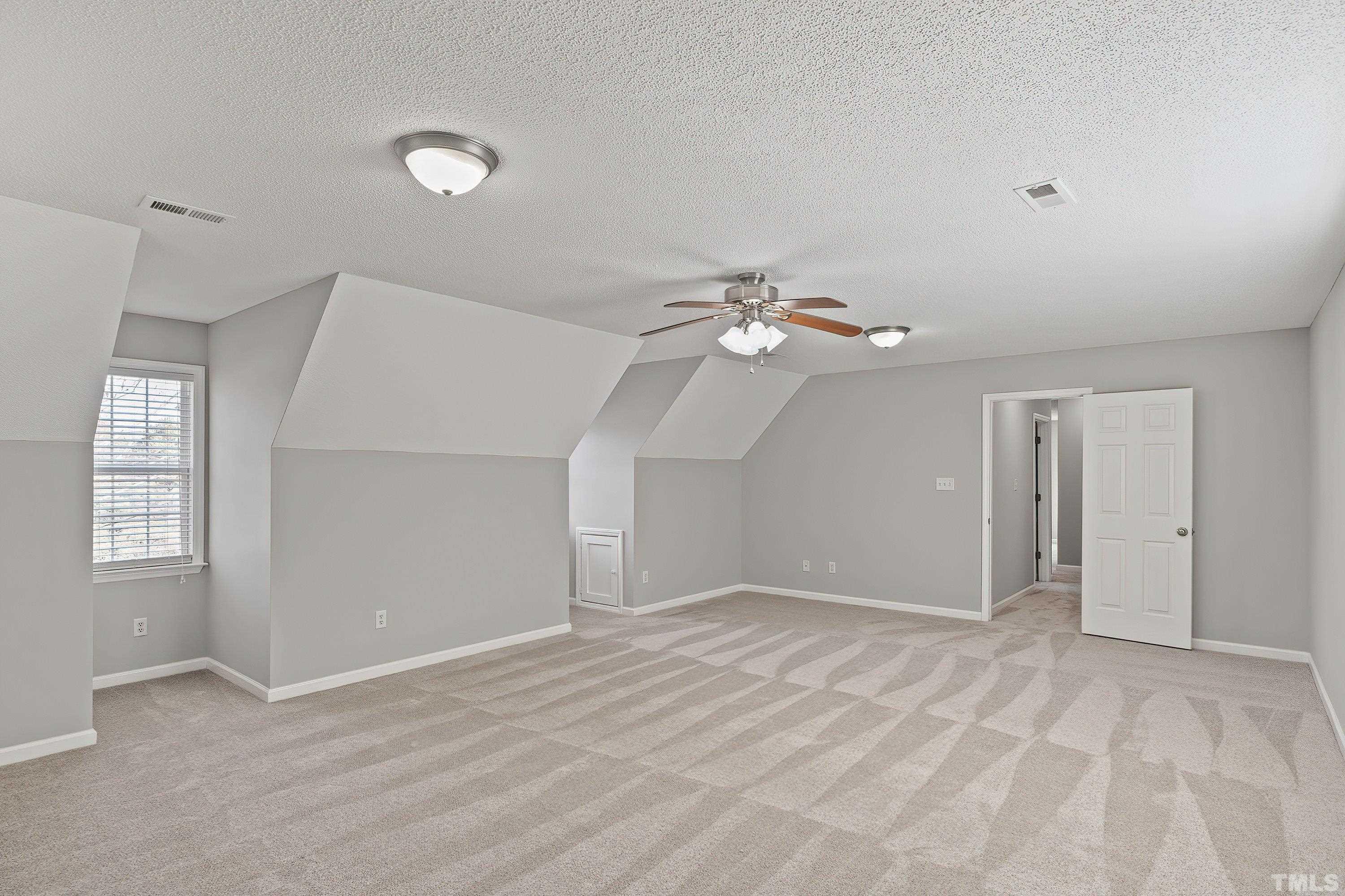 1008 Linden Crest Road Raleigh, NC 27603 - Photo 26 of 37 a view of an empty room with a window