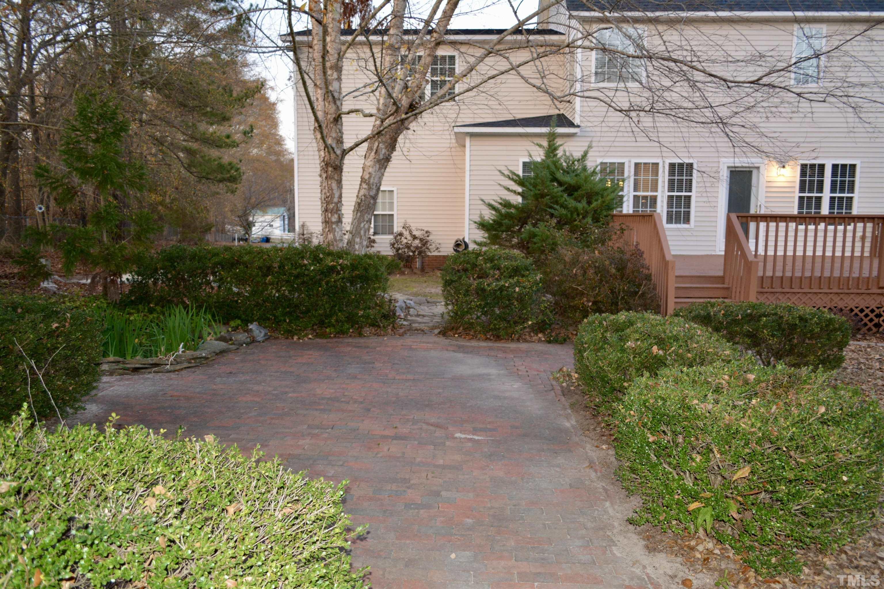 1008 Linden Crest Road Raleigh, NC 27603 - Photo 31 of 37 a view of a pathway with a house