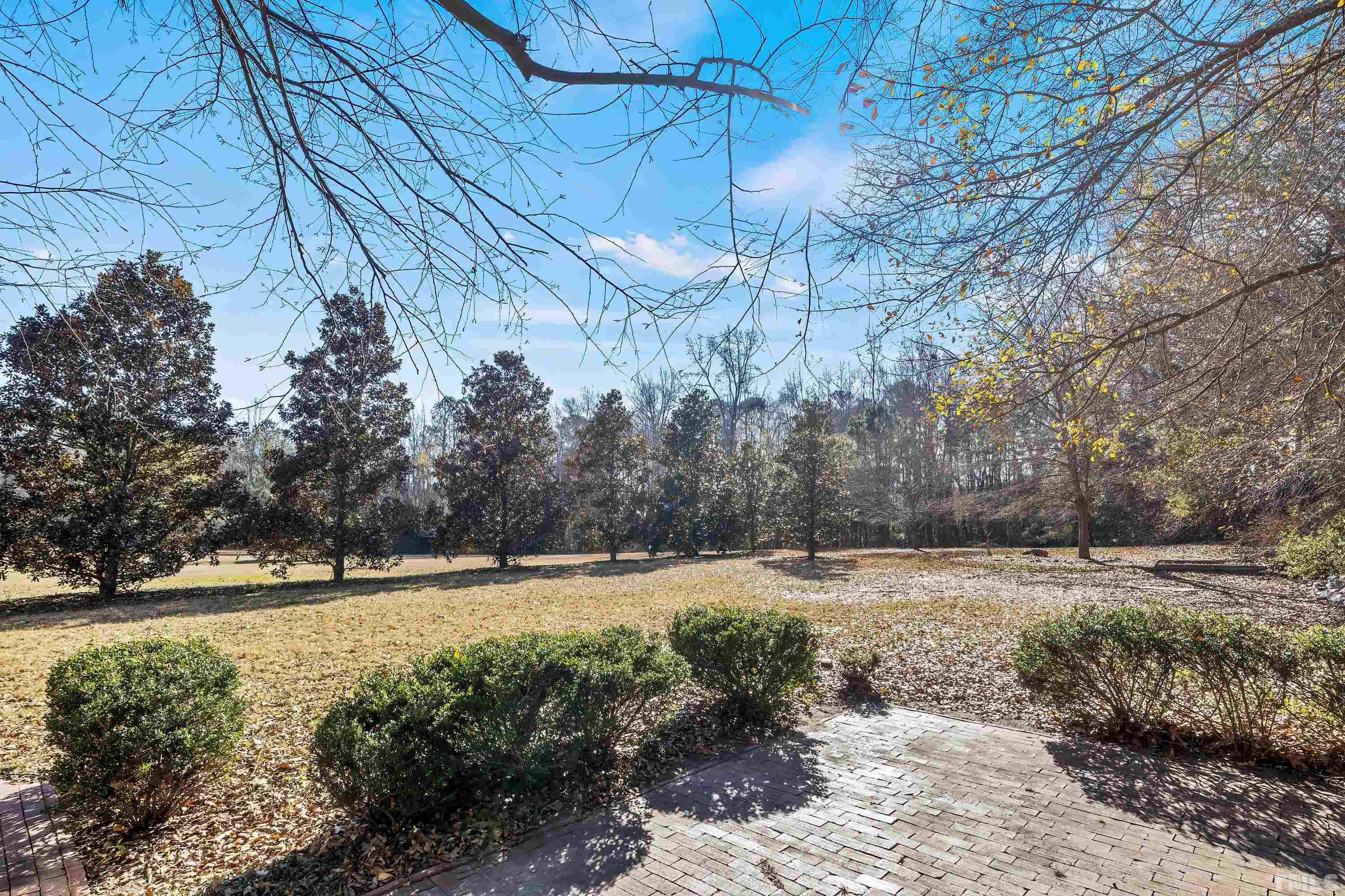 1008 Linden Crest Road Raleigh, NC 27603 - Photo 32 of 37 a view of an outdoor space with a lake view