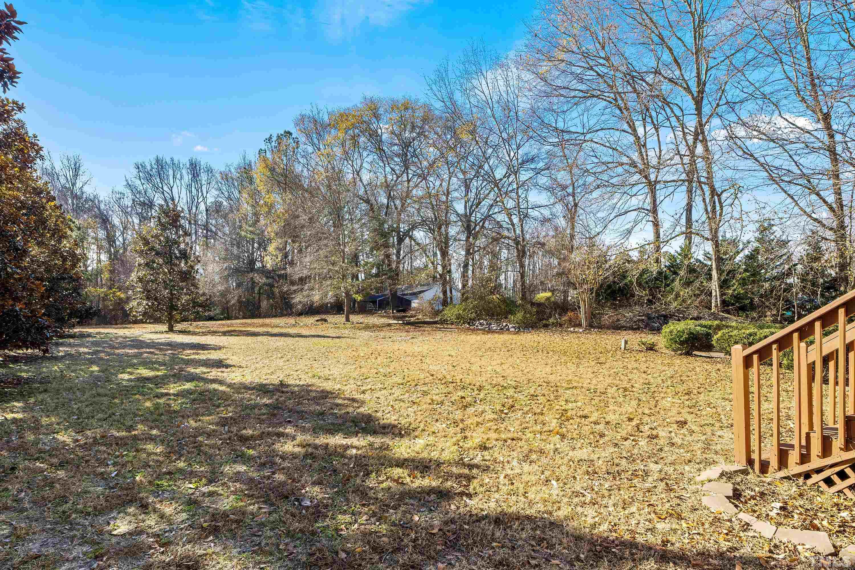 1008 Linden Crest Road Raleigh, NC 27603 - Photo 33 of 37 a view of a yard with wooden fence