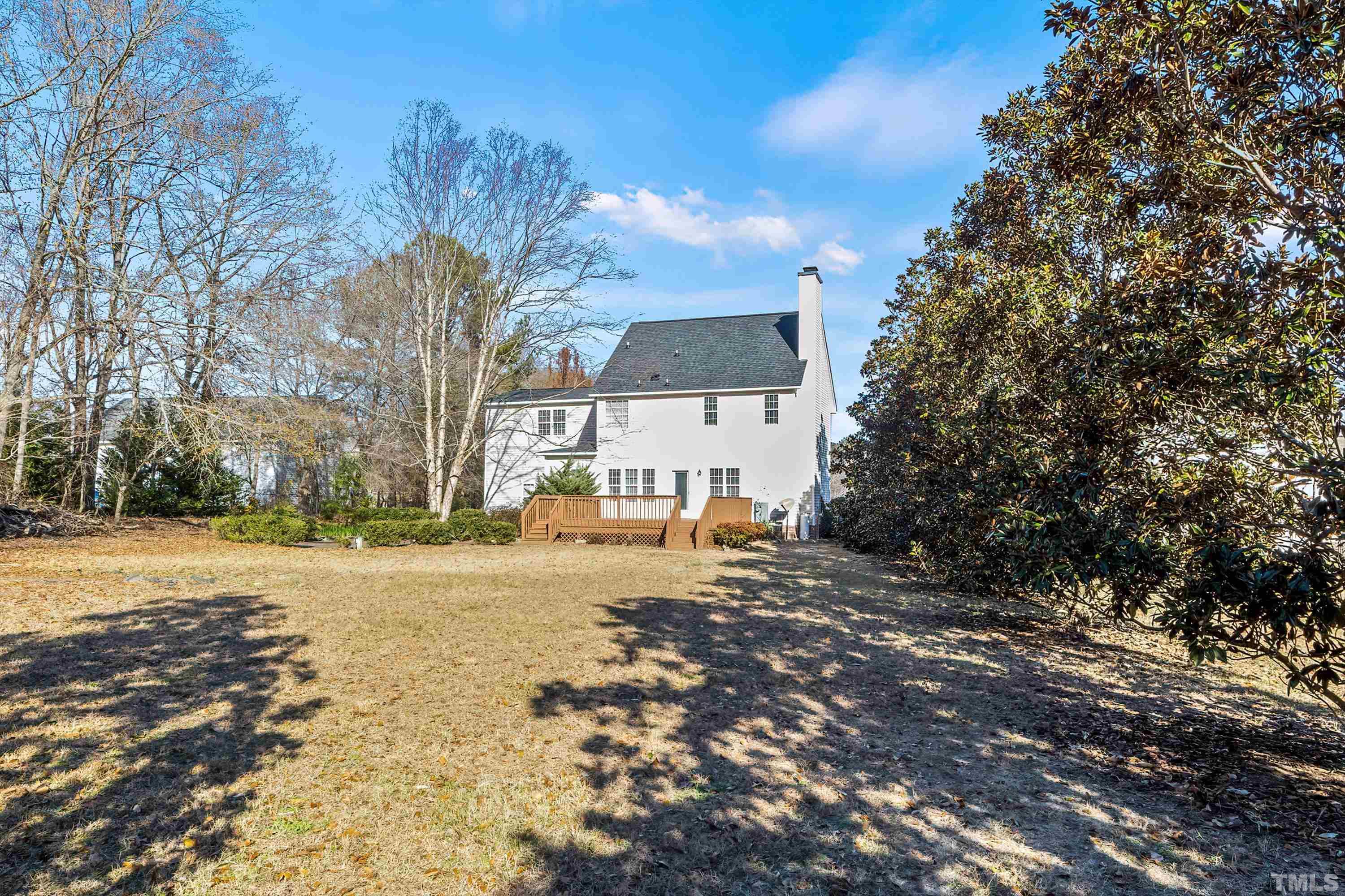 1008 Linden Crest Road Raleigh, NC 27603 - Photo 34 of 37 a view of a yard with a tree