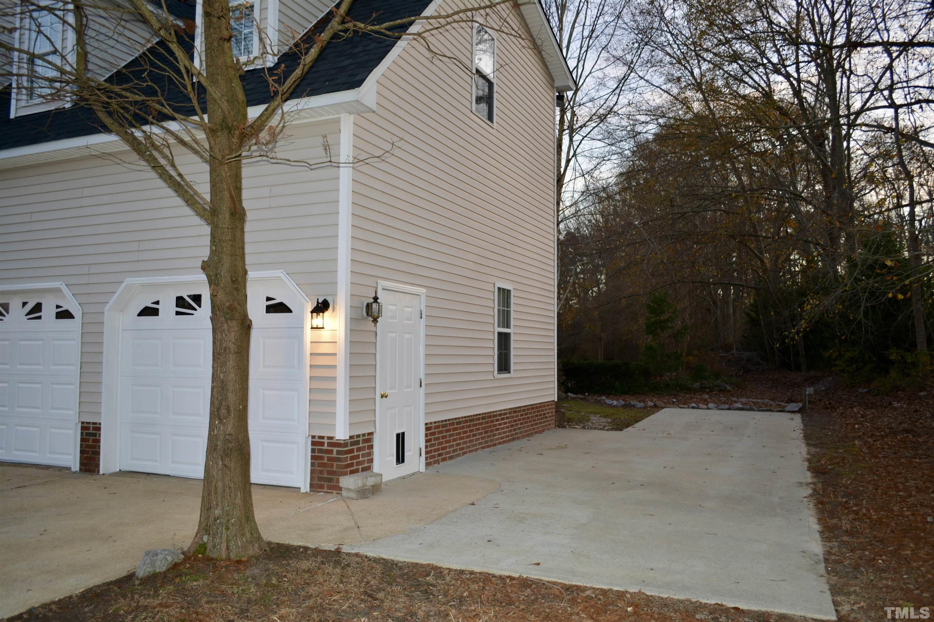 1008 Linden Crest Road Raleigh, NC 27603 - Photo 35 of 37 a view of a house with a yard