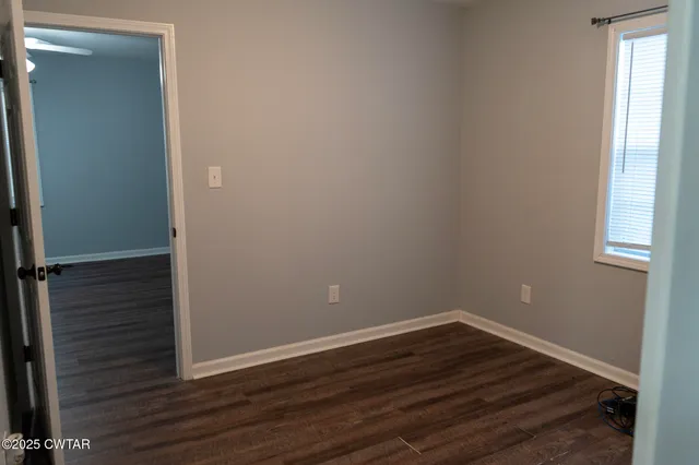 a view of small space with wooden floor