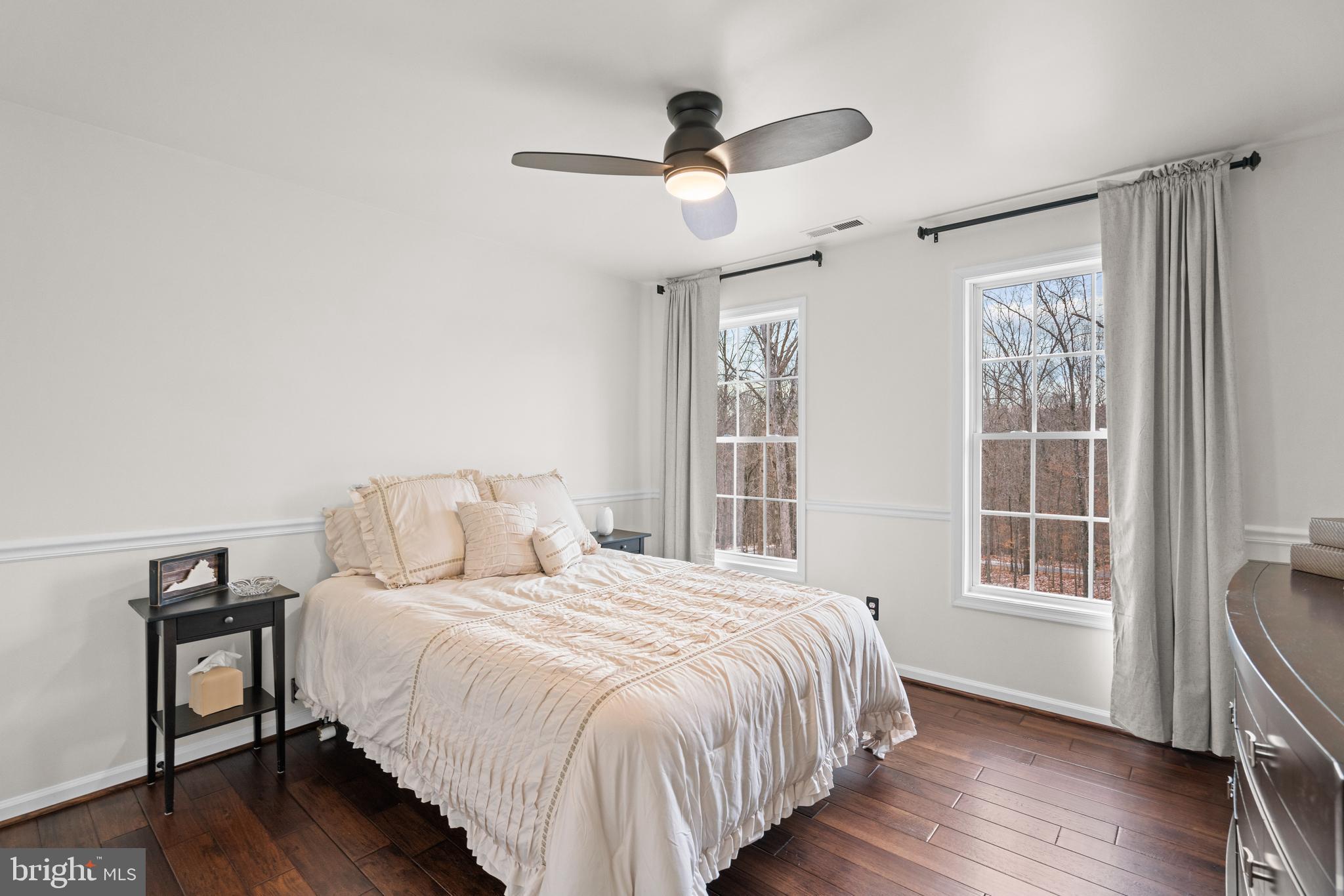 10448 Wheatley School Road Marshall, VA 20115 - Photo 24 of 40 a bedroom with a bed and a window