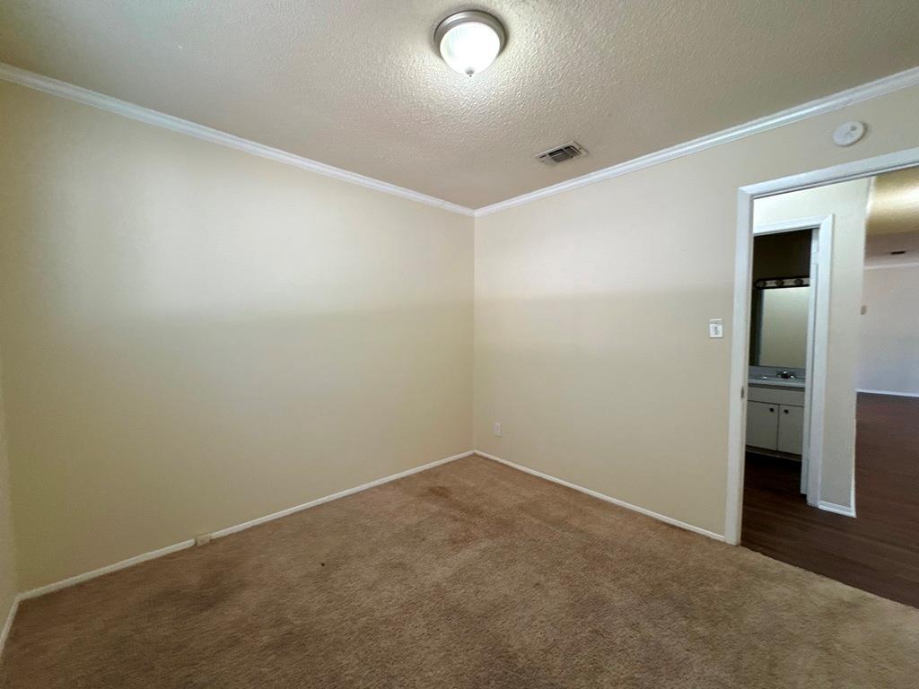 5905 Burrough Drive Austin, TX 78745 - Photo 29 of 40 an empty room with closet