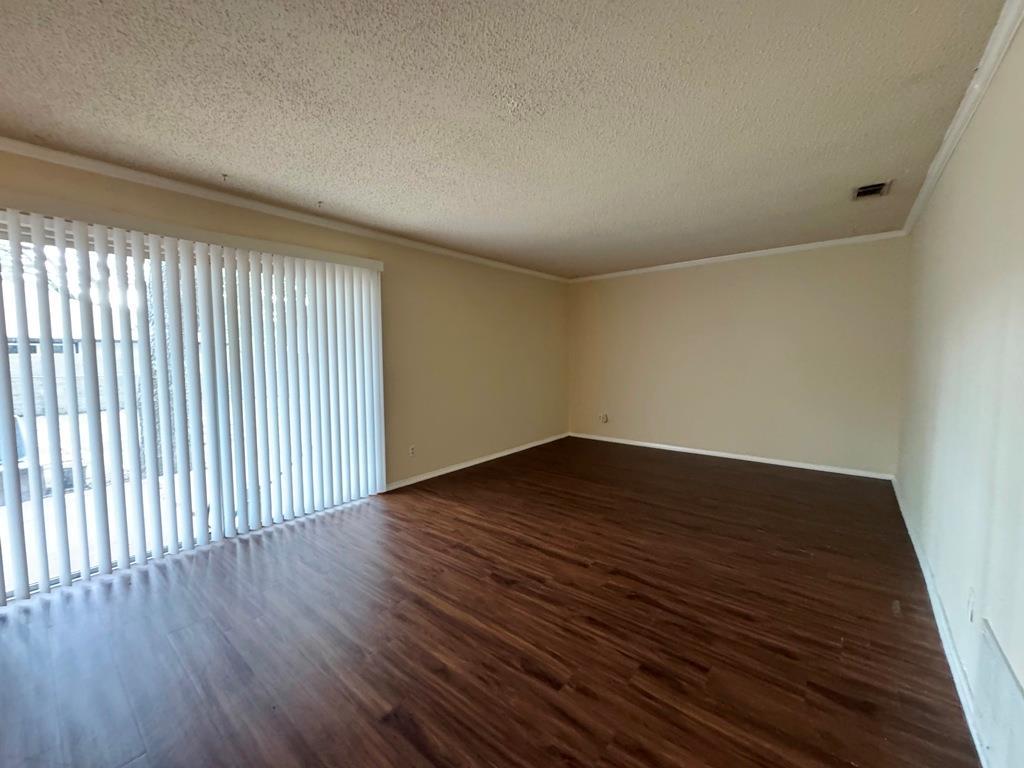 5905 Burrough Drive Austin, TX 78745 - Photo 7 of 40 an empty room with wooden floor
