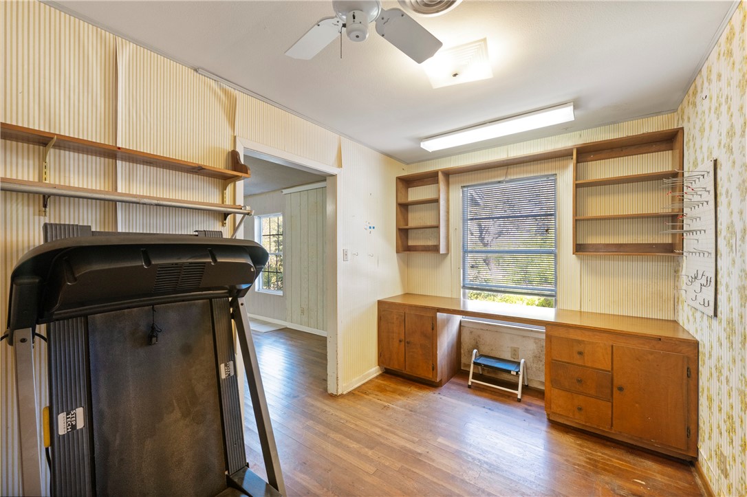 12844 Hearn Road Corpus Christi, TX 78410 - Photo 23 of 34 a view of a room with wooden floor and furniture