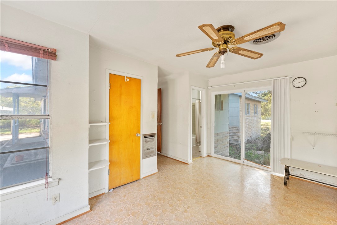 12844 Hearn Road Corpus Christi, TX 78410 - Photo 28 of 34 a view of a room with a window and wooden floor