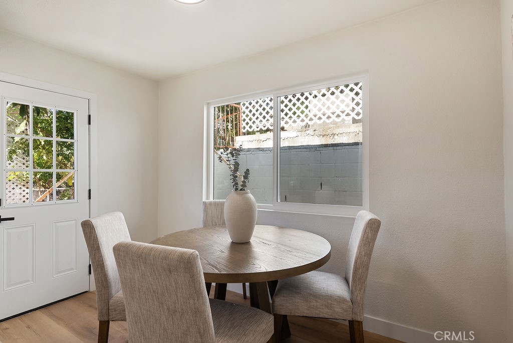 5139 San Rafael Avenue Los Angeles, CA 90042 - Photo 17 of 60 a view of a dining room with furniture window and wooden floor