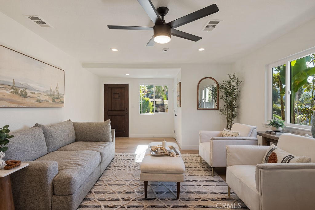 5139 San Rafael Avenue Los Angeles, CA 90042 - Photo 2 of 60 a living room with furniture and a ceiling fan