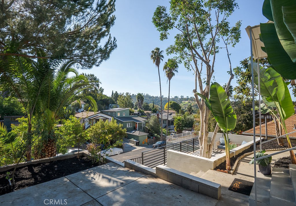 5139 San Rafael Avenue Los Angeles, CA 90042 - Photo 46 of 60 a view of a swimming pool with a patio and a garden