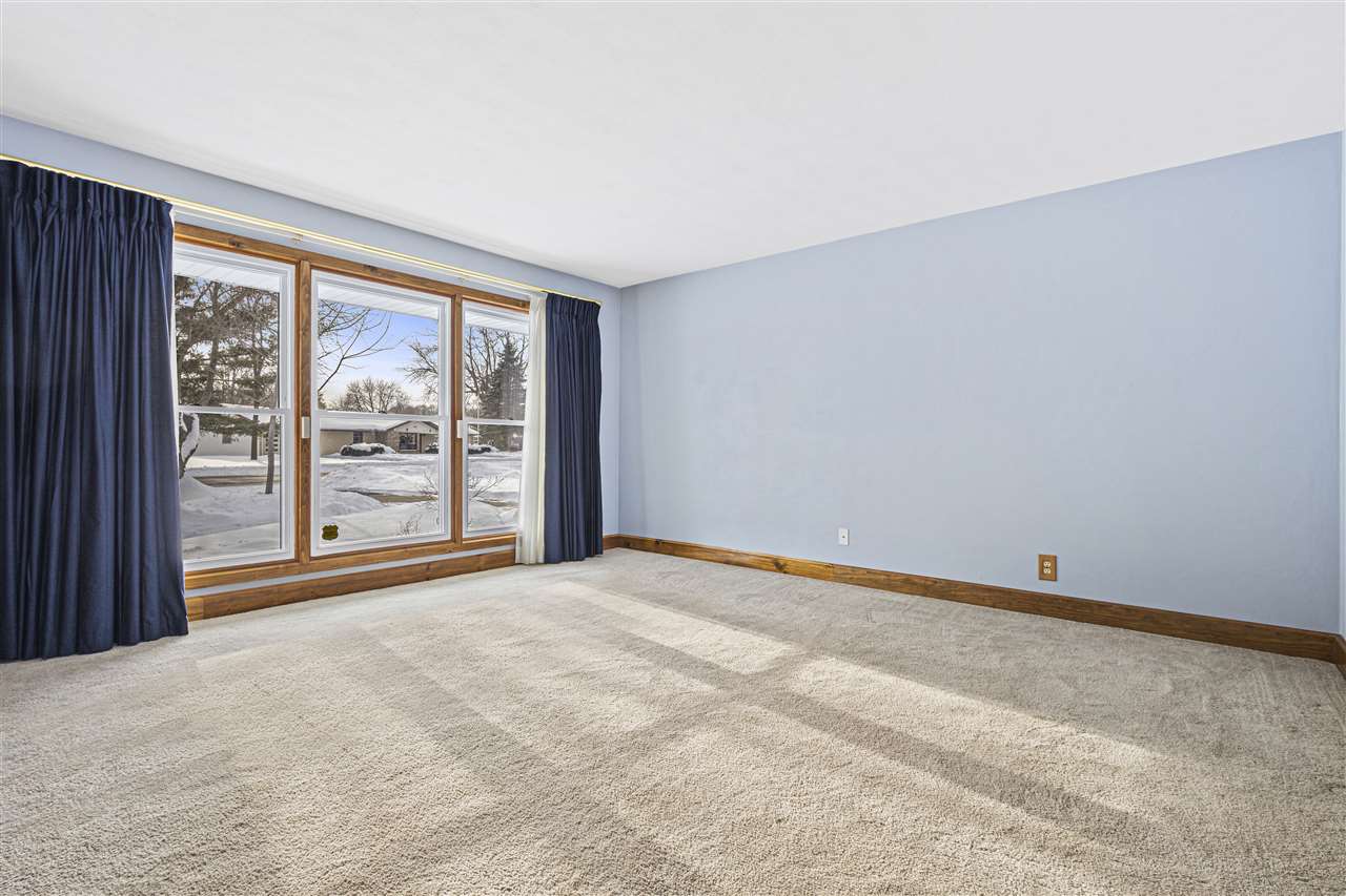 4064 Valerie Road Roscoe, IL 61073 - Photo 3 of 38 a view of an empty room with a window