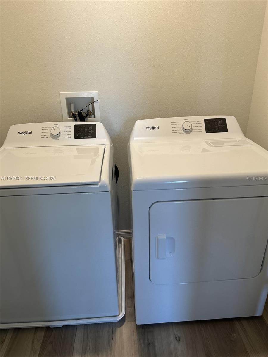 8196 Southwest 67th Avenue Ocala, FL 34476 - Photo 13 of 13 a utility room with dryer and washer