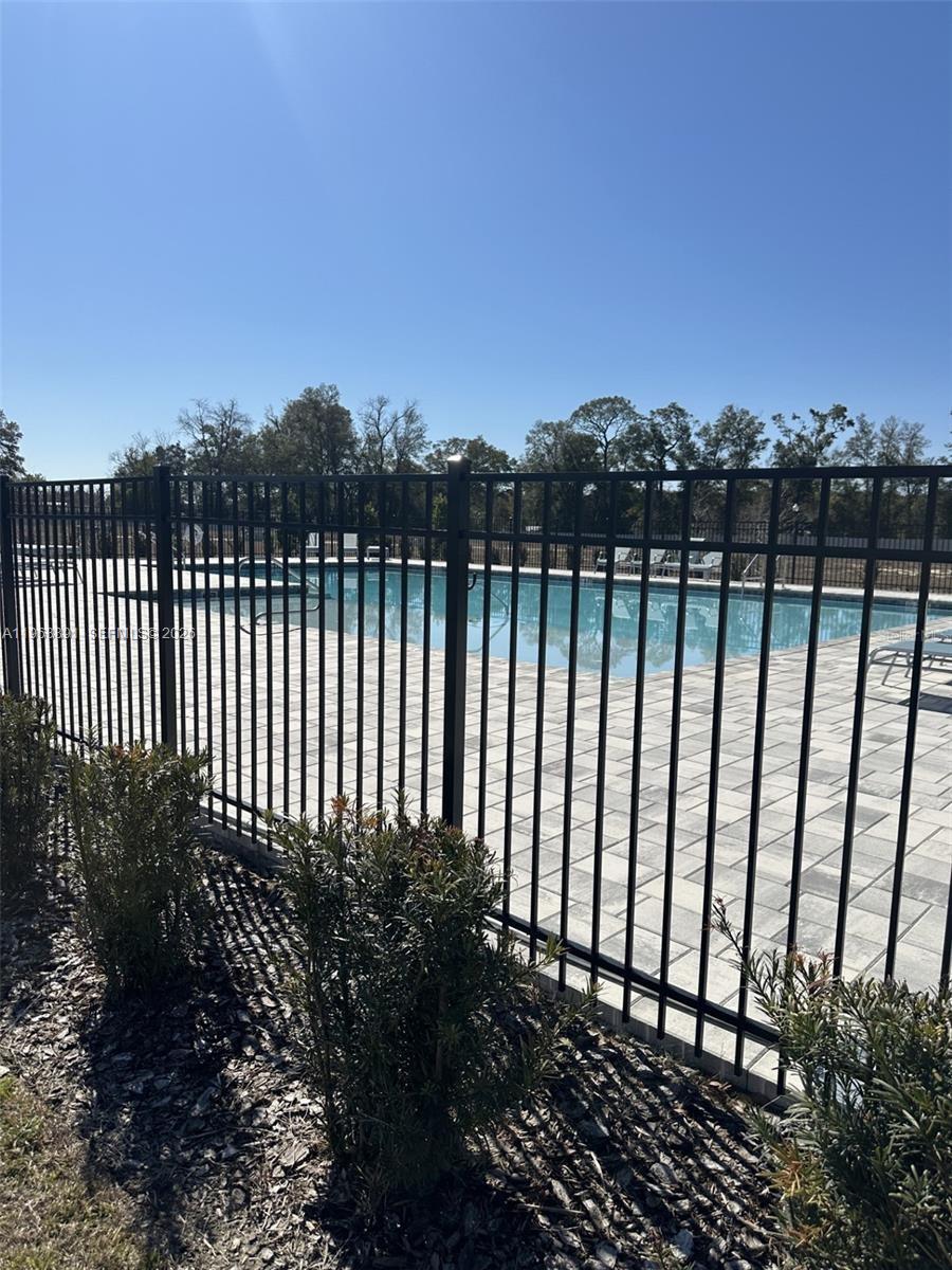 8196 Southwest 67th Avenue Ocala, FL 34476 - Photo 6 of 13 a view of a garden