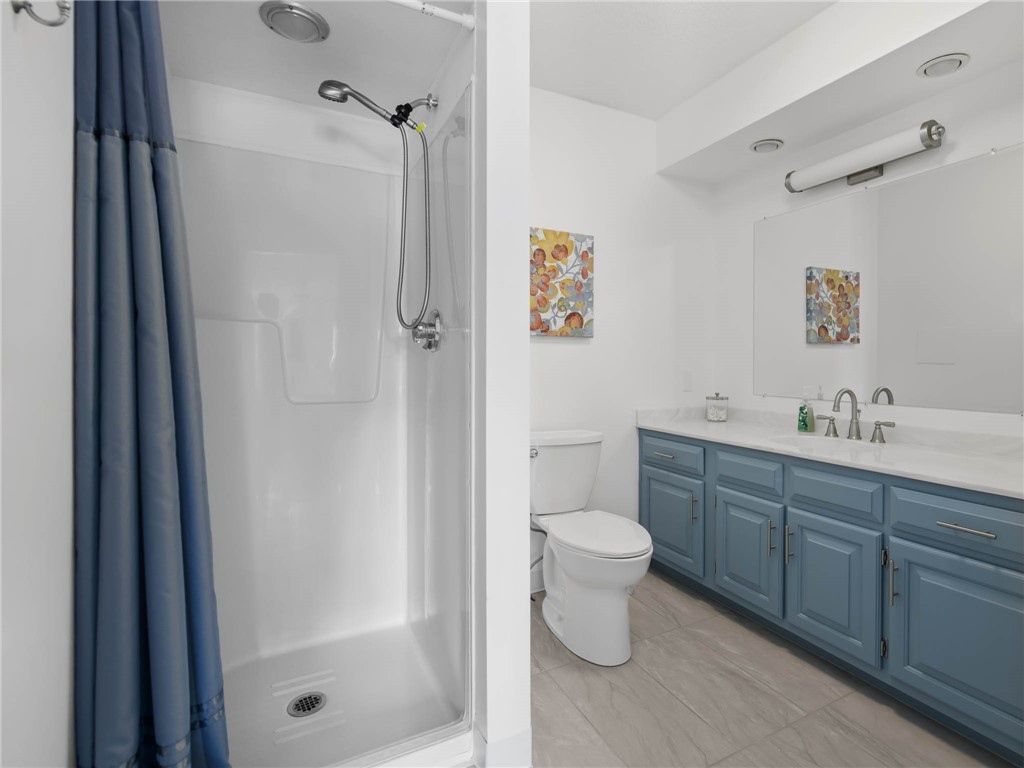 4042 Post Road, Unit 7 Warwick, RI 02886 - Photo 21 of 31 Stall shower in the en-suite bathroom