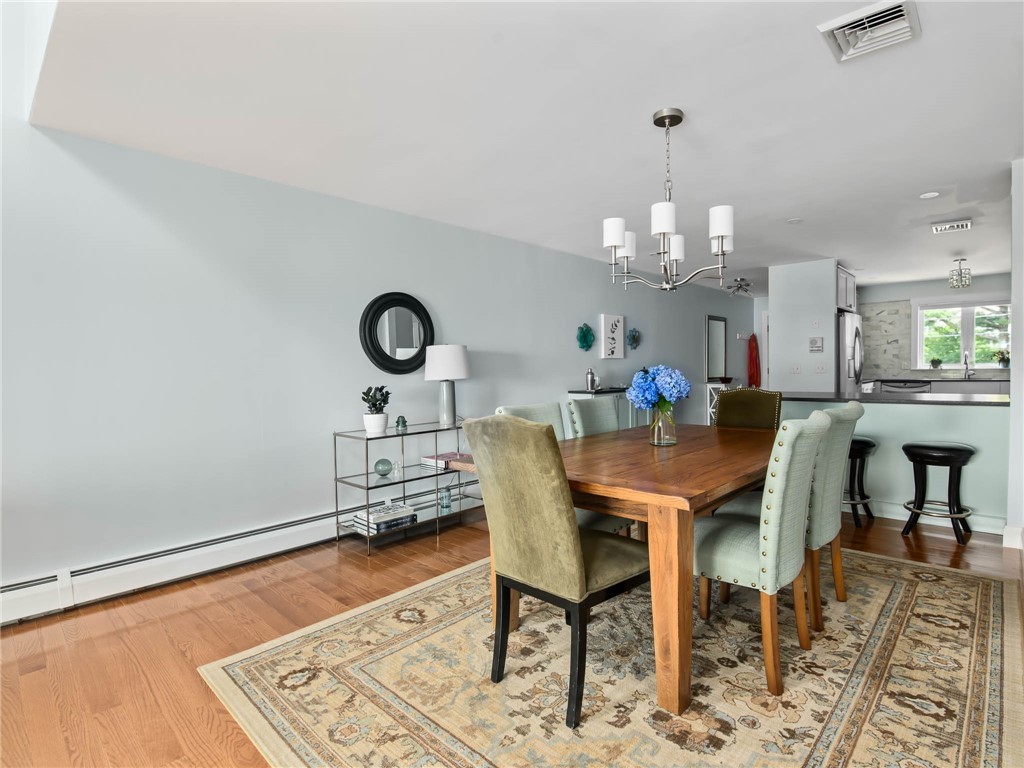 4042 Post Road, Unit 7 Warwick, RI 02886 - Photo 8 of 31 Dining area looking into the kitchen