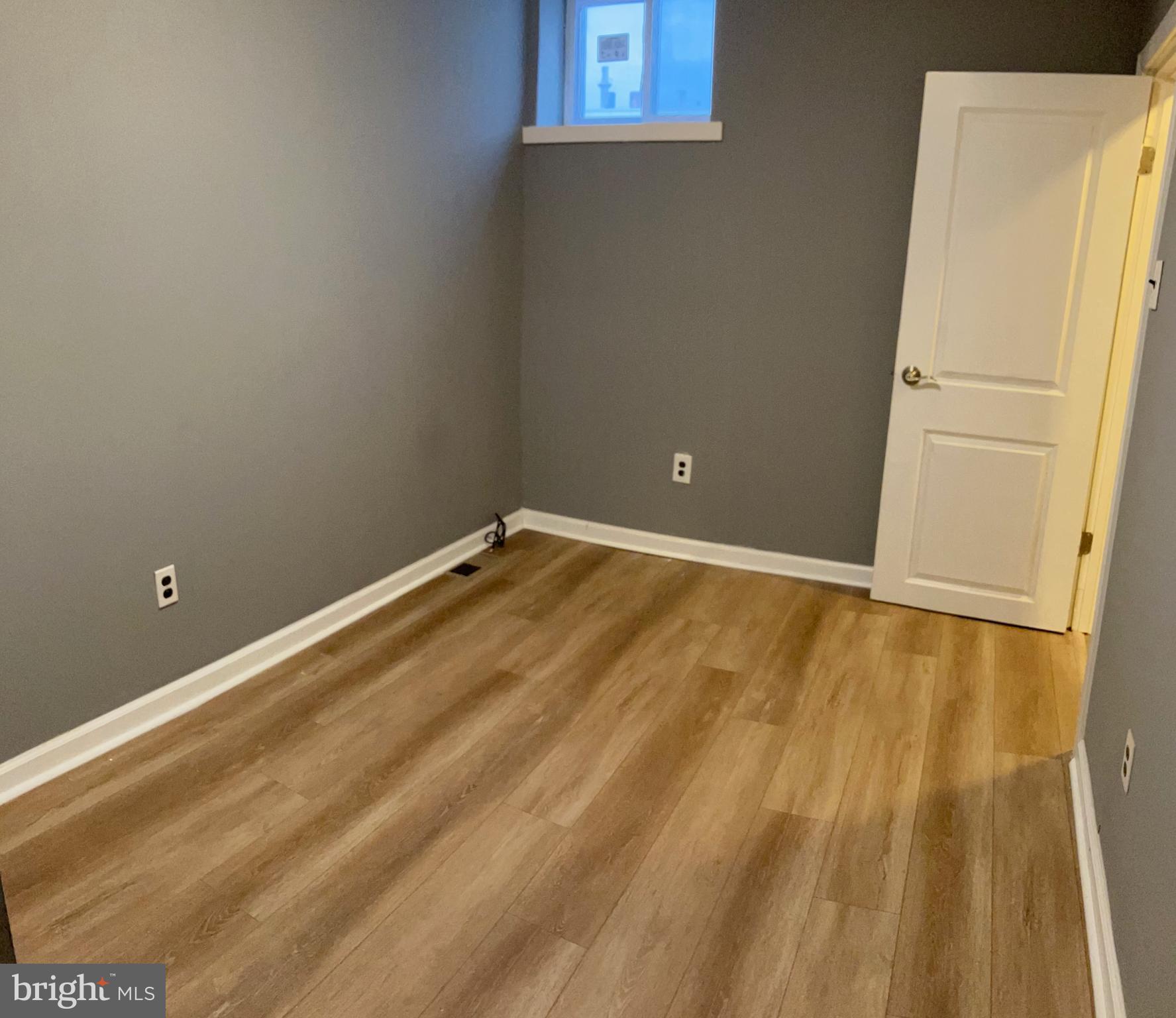 2625 Manton Street Philadelphia, PA 19146 - Photo 15 of 25 a view of a room with wooden floor and cabinet