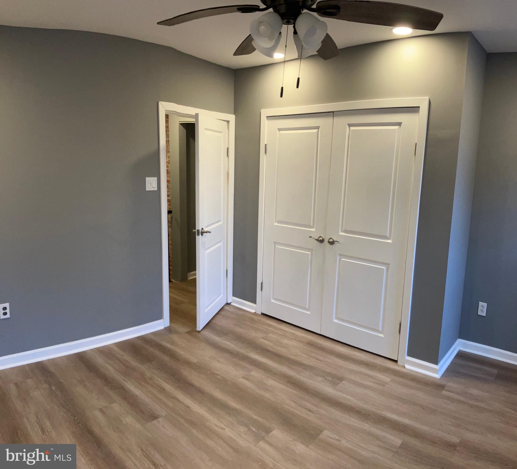 2625 Manton Street Philadelphia, PA 19146 - Photo 17 of 25 an empty room with wooden floor closet and windows