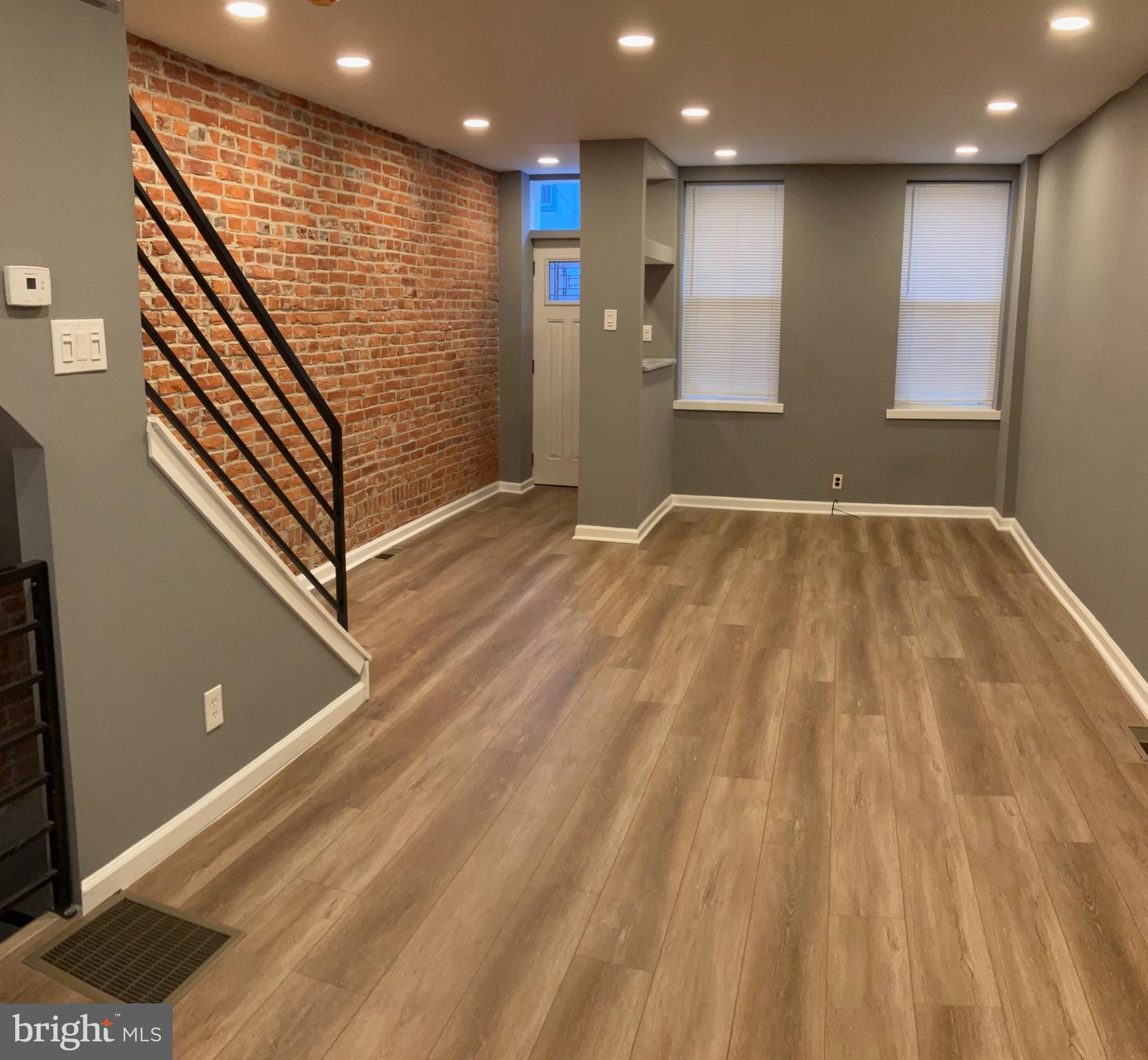 2625 Manton Street Philadelphia, PA 19146 - Photo 8 of 25 a view of an empty room with wooden floor