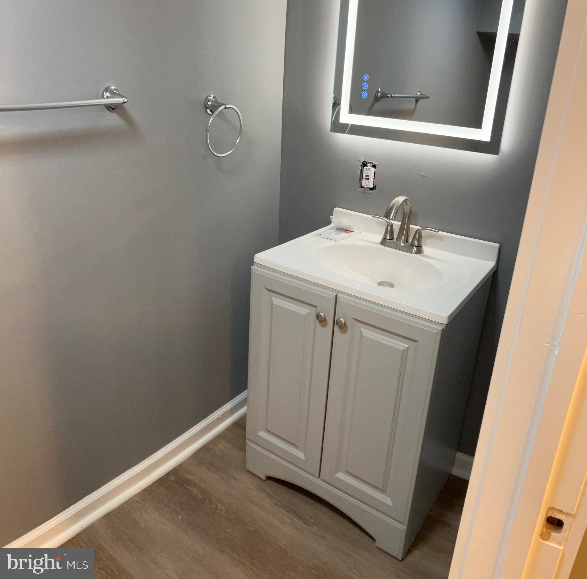2625 Manton Street Philadelphia, PA 19146 - Photo 9 of 25 a utility room with cabinets washer and dryer