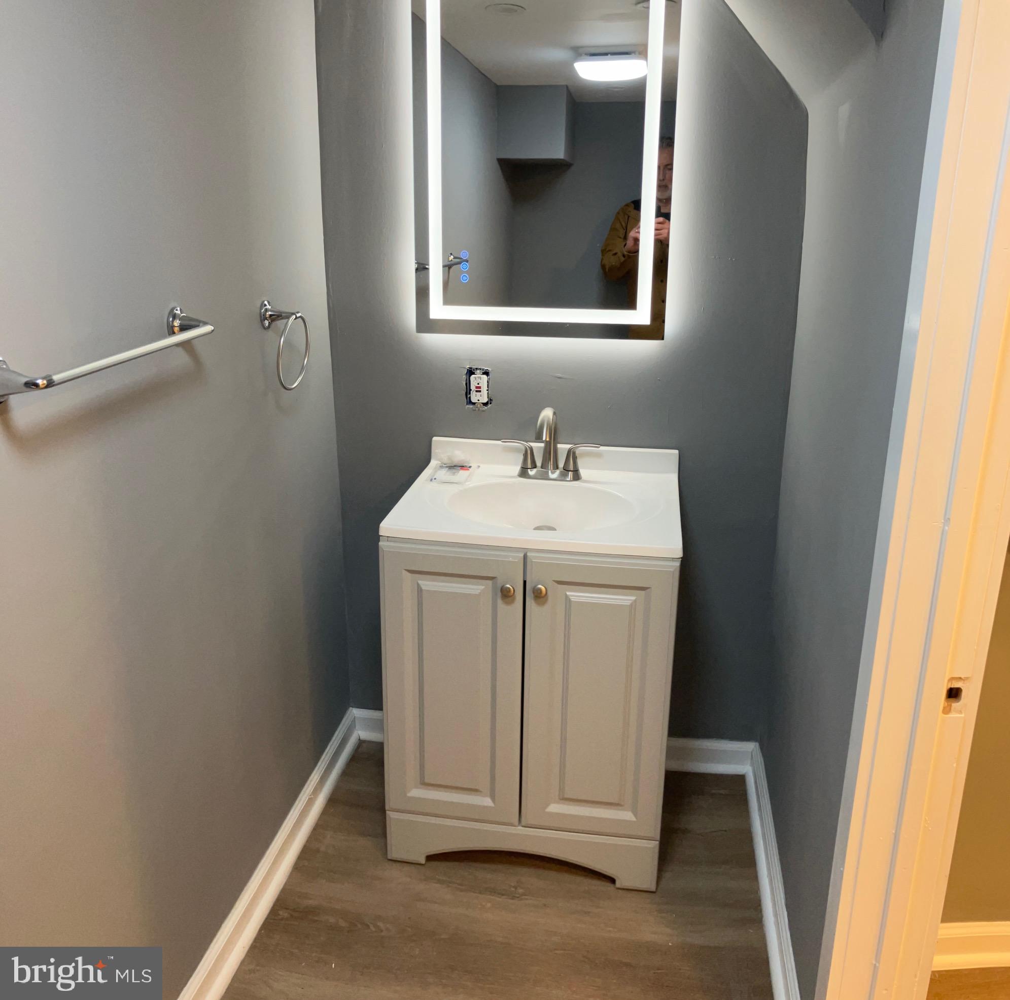 2625 Manton Street Philadelphia, PA 19146 - Photo 10 of 25 a bathroom with a sink and a mirror